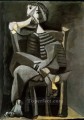 Hombre sentado tejiendo rayas 1939 Pablo Picasso